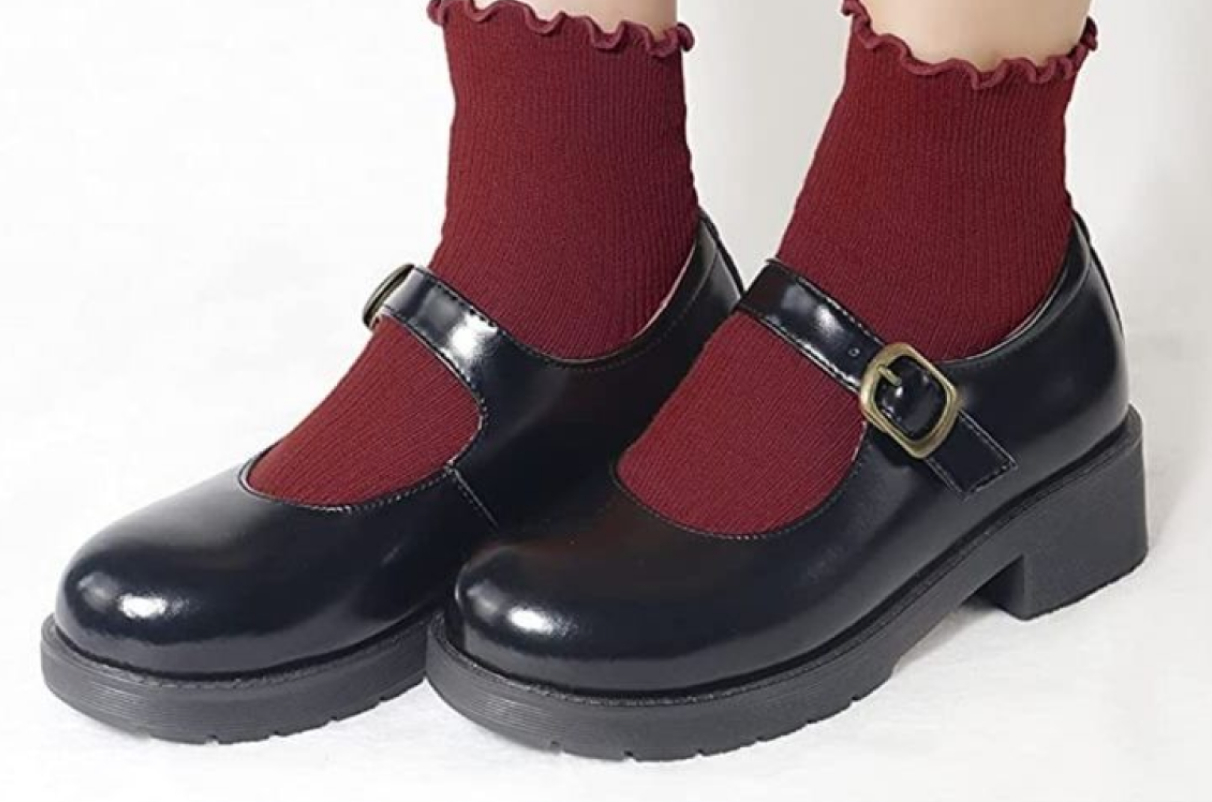 Black Mary Janes with chunky heels and ruffled red socks