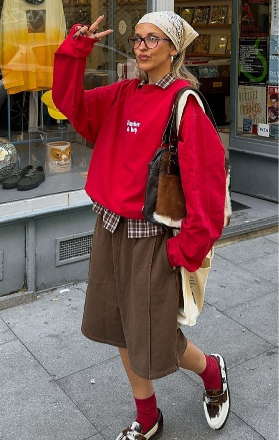 Grungy preppy mix with bold layers, chunky loafers, and a statement bandana.